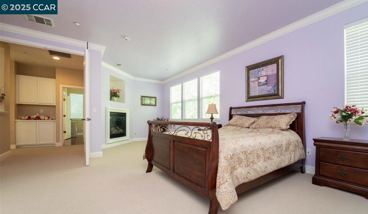 1849 Alexander Way Brentwood, CA 94513 - Photo 29 of 38 a bedroom with a bed and a cabinets