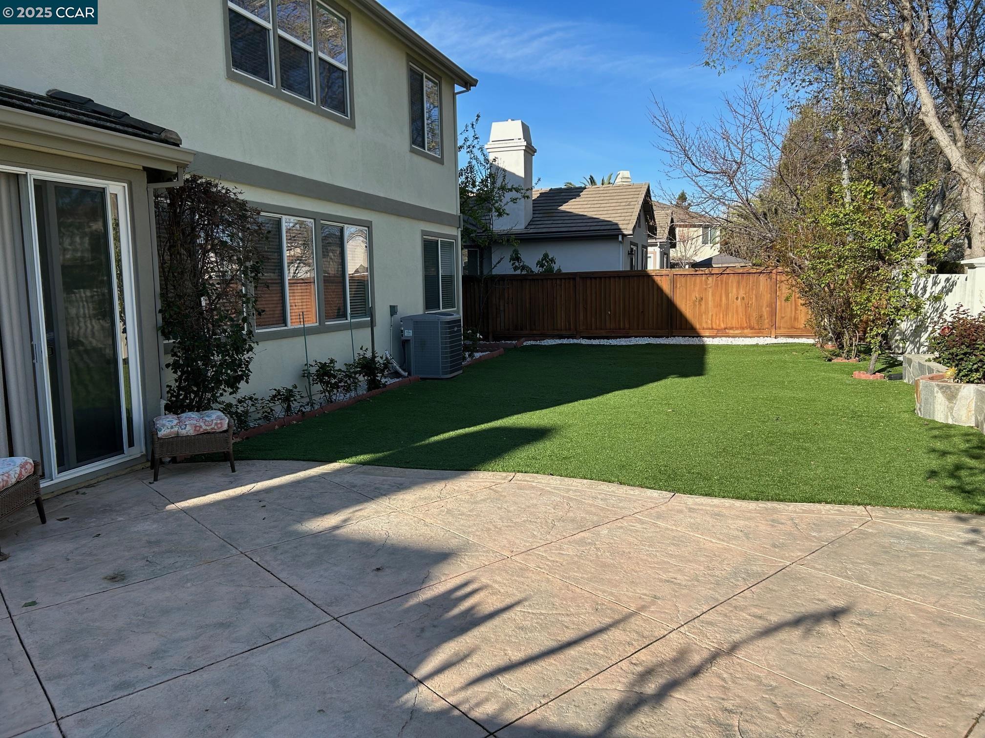 1849 Alexander Way Brentwood, CA 94513 - Photo 34 of 38 a view of a building with a yard