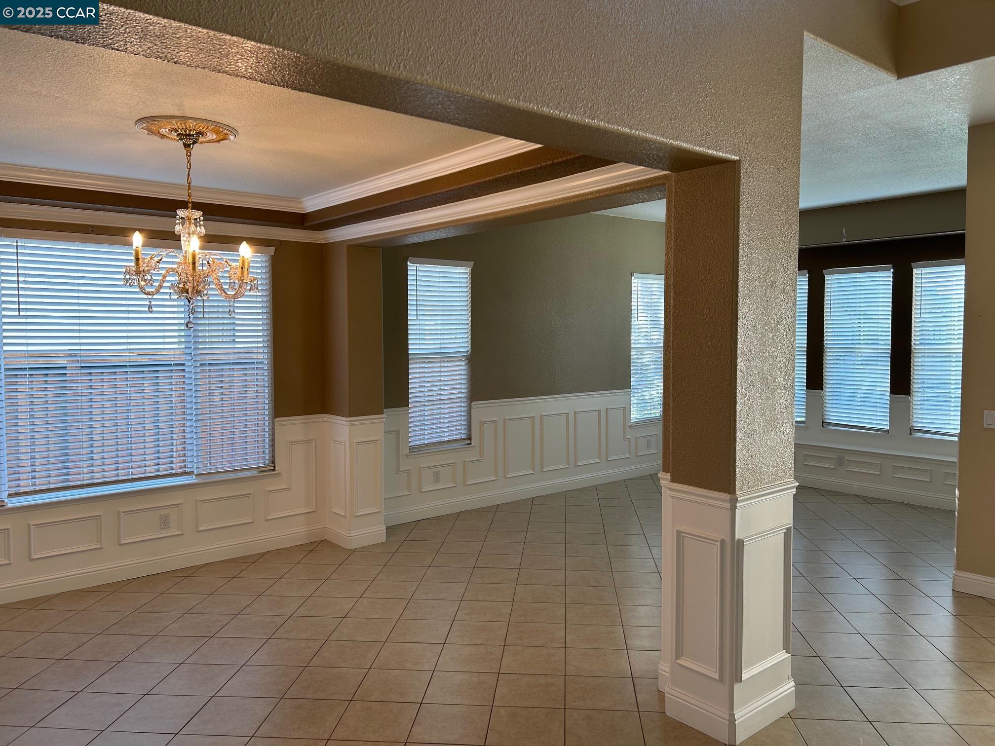 1849 Alexander Way Brentwood, CA 94513 - Photo 5 of 38 a view of empty room with wooden floor and fan