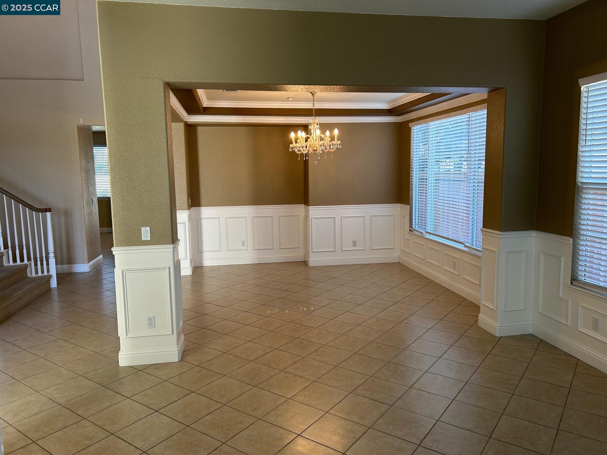 1849 Alexander Way Brentwood, CA 94513 - Photo 6 of 38 a view of an empty room with wooden floor and a window