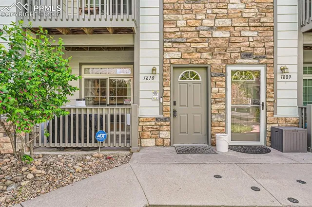 a front view of a house with a door