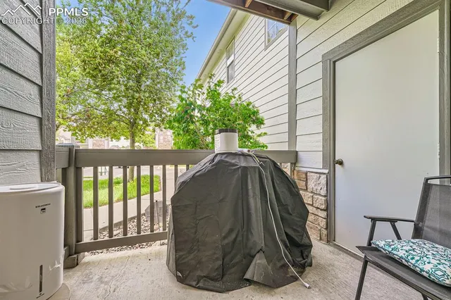 a view of balcony with furniture