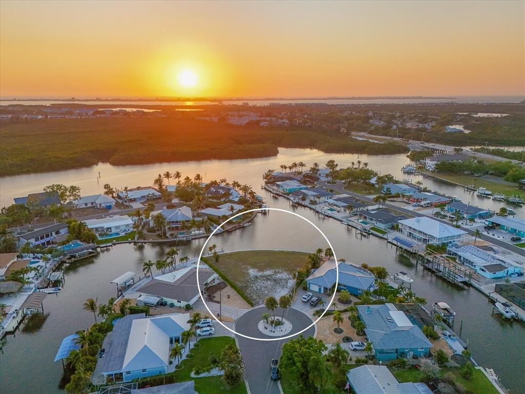 10412 Kingfisher Road West Bradenton, FL 34209 - Photo 1 of 7 an aerial view of residential building and lake
