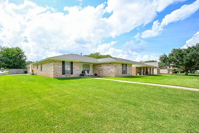 a room with furniture and wooden floor