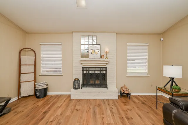 a kitchen with kitchen island granite countertop lots of counter top space and stainless steel appliances