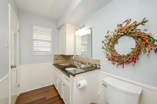 a view of a two chairs in the patio