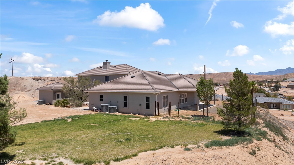 575 Gann Avenue Logandale, NV 89021 - Photo 65 of 75 Perched atop a hill, this desert home offers commanding views of the expansive landscape.