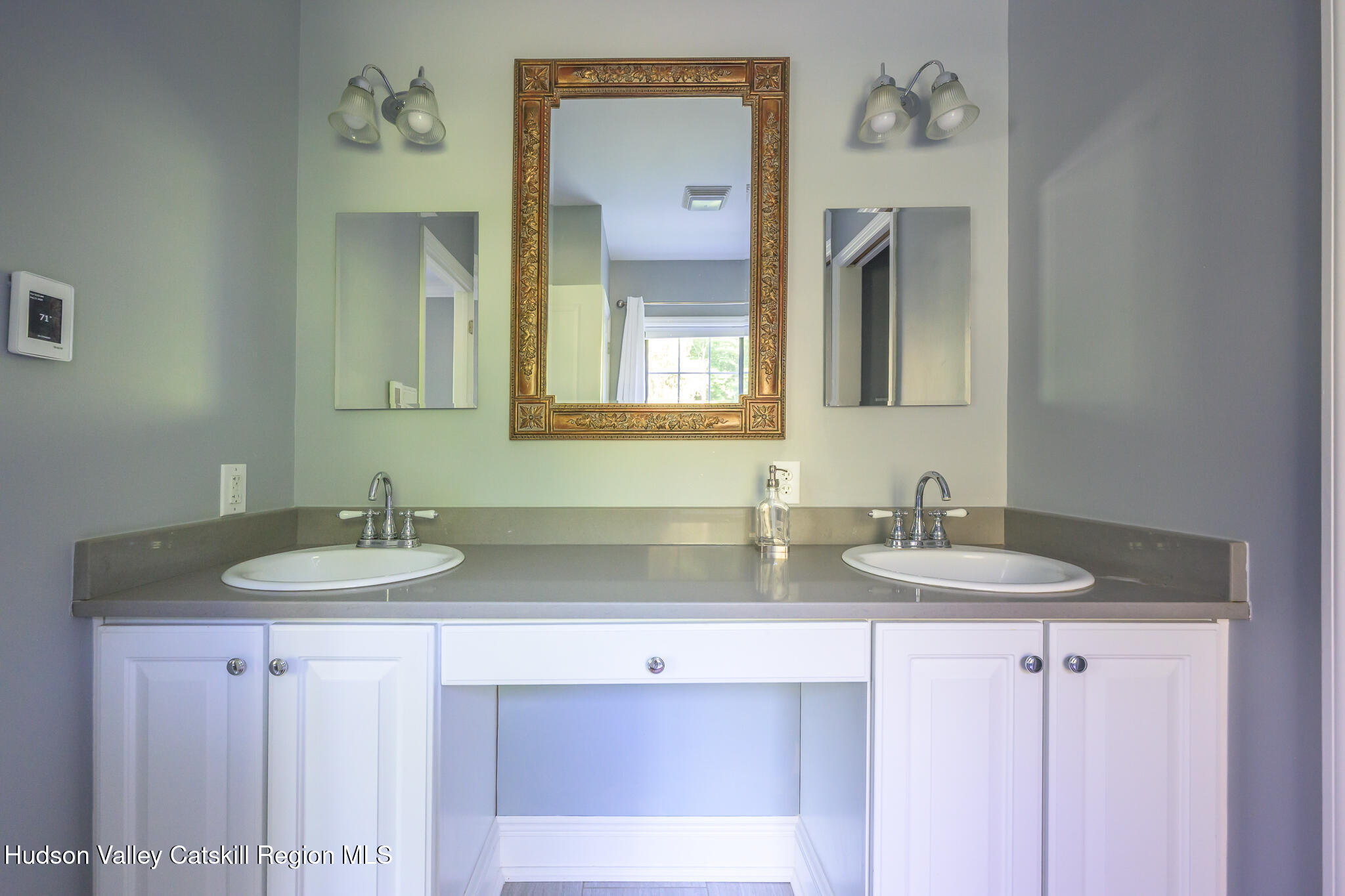 218 Decker Road Craryville, NY 12521 - Photo 12 of 21 a bathroom with a granite countertop sink and a mirror