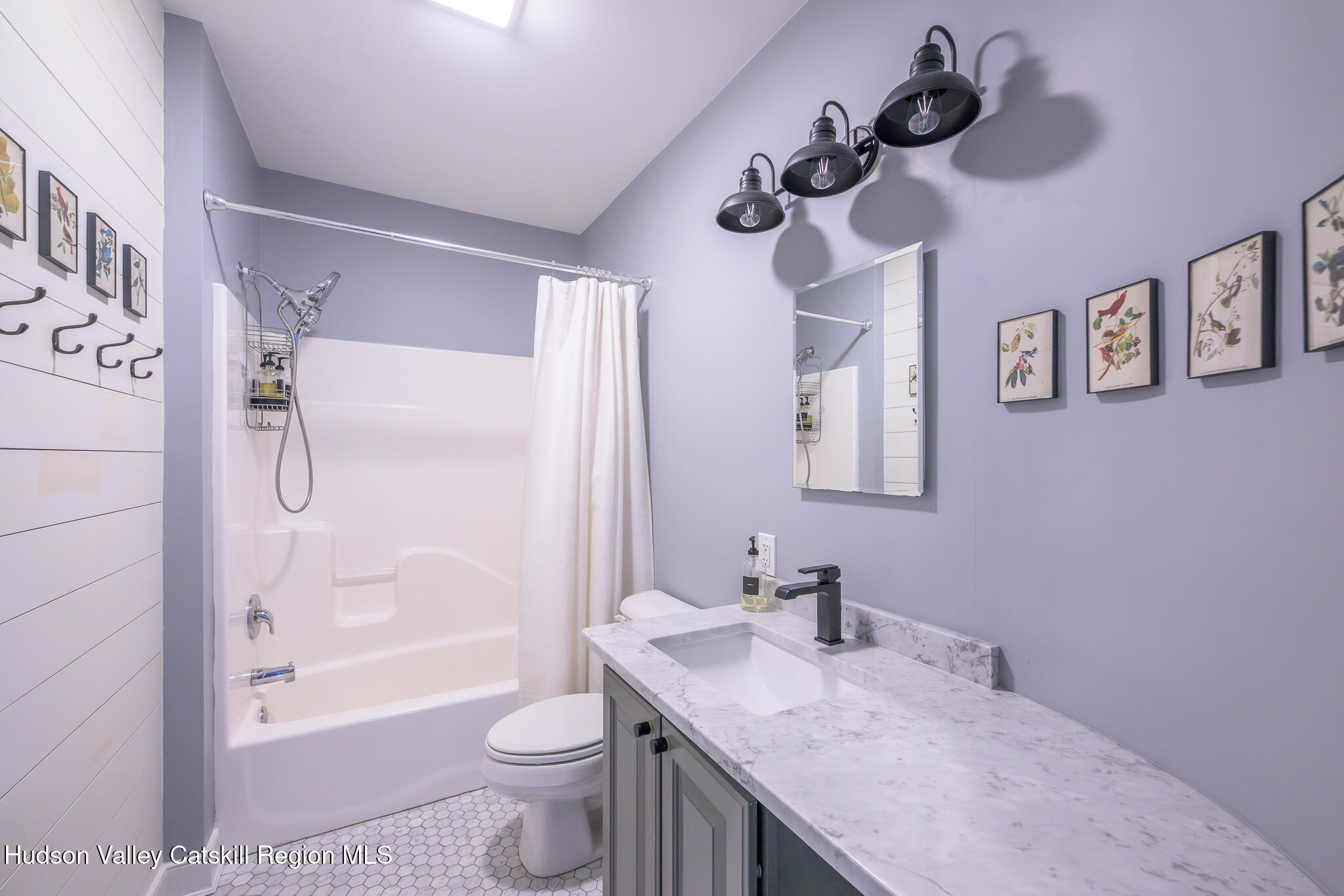 218 Decker Road Craryville, NY 12521 - Photo 13 of 21 a bathroom with a granite countertop sink a toilet and shower