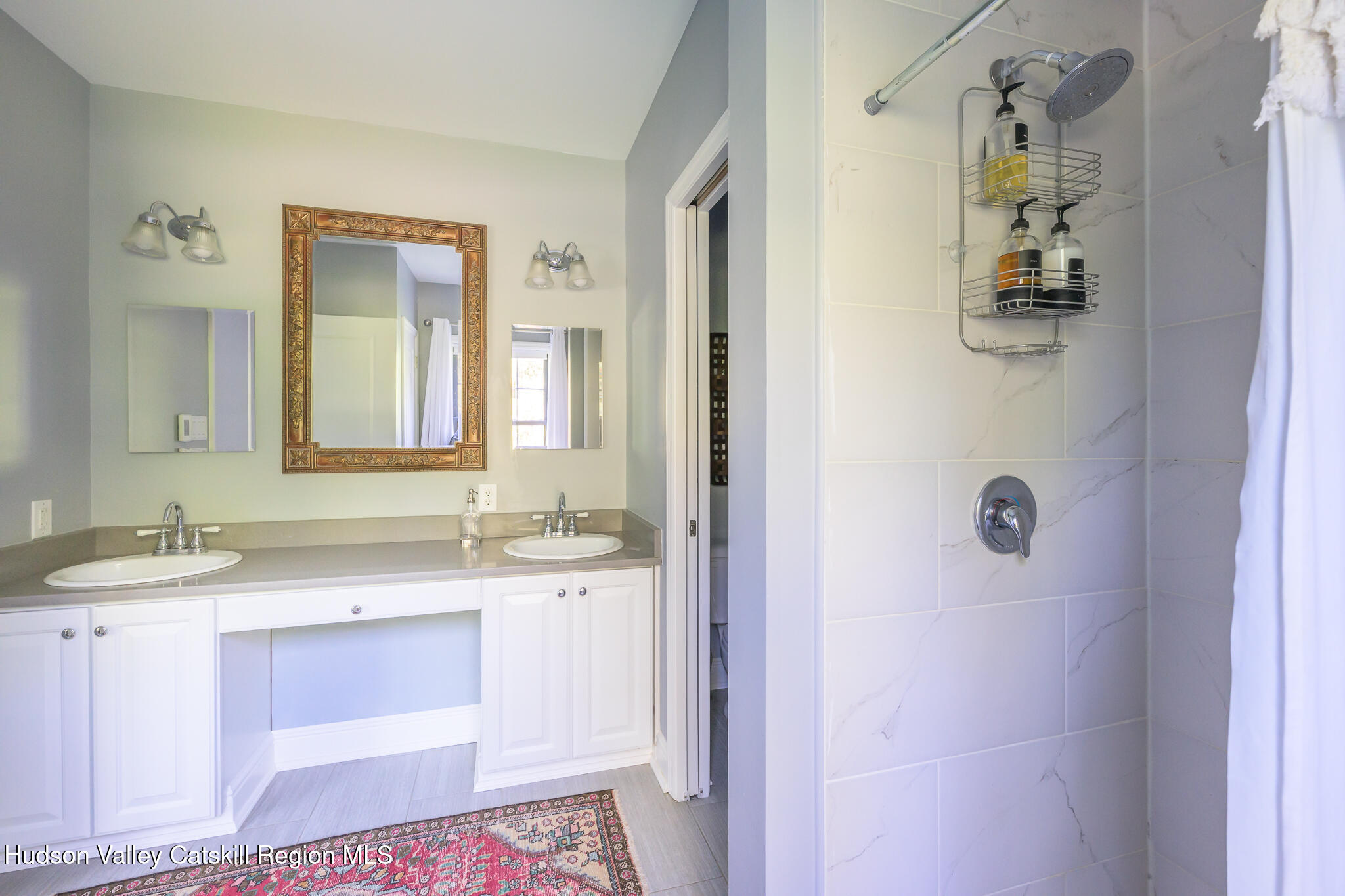 218 Decker Road Craryville, NY 12521 - Photo 14 of 21 a bathroom with a sink a vanity and a mirror