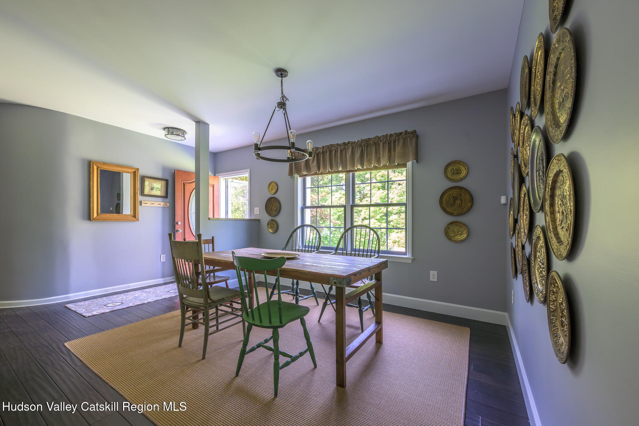 218 Decker Road Craryville, NY 12521 - Photo 7 of 21 a view of a dining room with furniture window and wooden floor