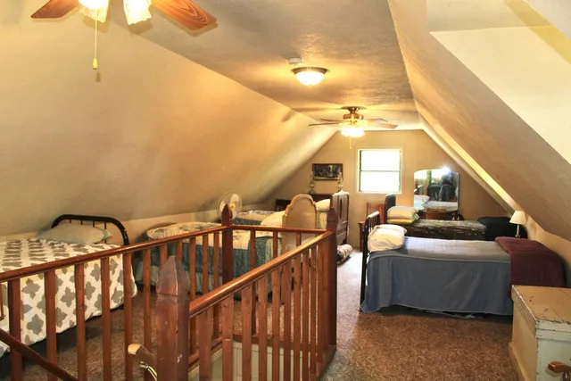 a view of an chairs and table in the balcony