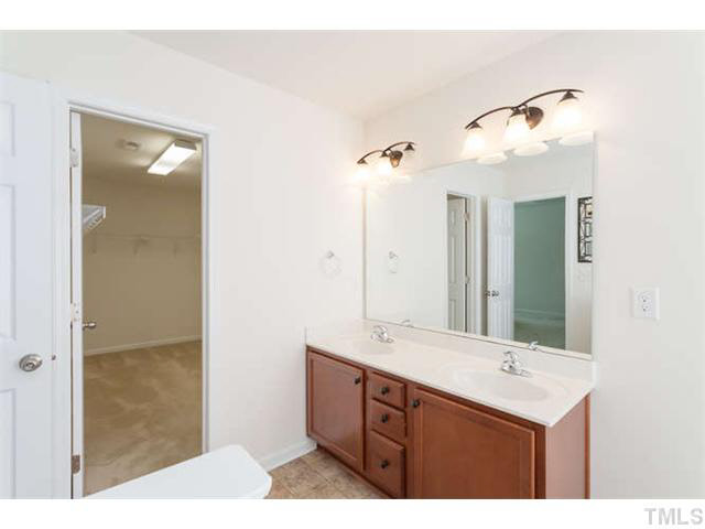 1413 Pattersons Mill Road Durham, NC 27703 - Photo 14 of 25 Master bath has access to large walk in closet.