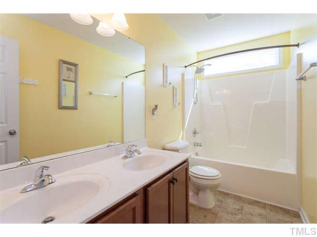 1413 Pattersons Mill Road Durham, NC 27703 - Photo 19 of 25 Hall bath with dual sinks.
