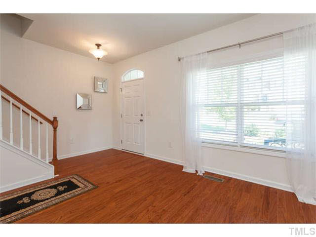 Bright and open foyer that leads into the living room.