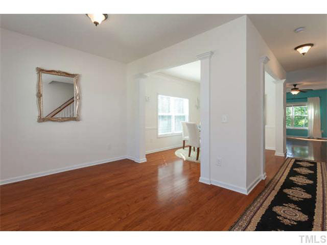 Great versatile living room that is perfect to use how it best fits you needs. Space is open to the formal dining area.