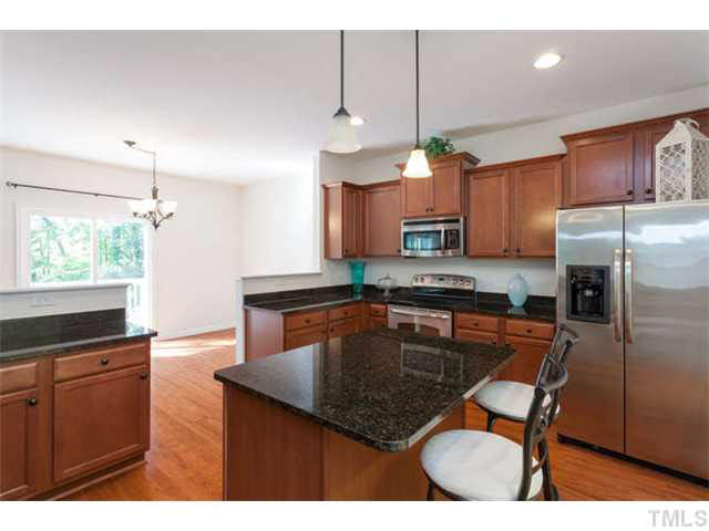 Wonderful kitchen with stainless appliances, granite counters, center island and tons of storage space!