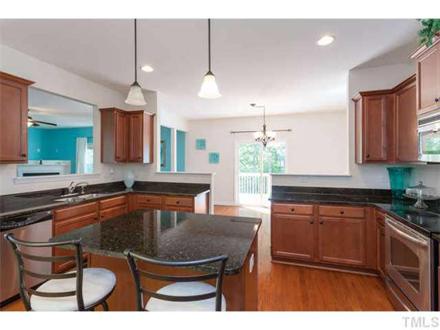 1413 Pattersons Mill Road Durham, NC 27703 - Photo 8 of 25 Kitchen is a bright and open space with plenty of room to cook up your favorite meals.