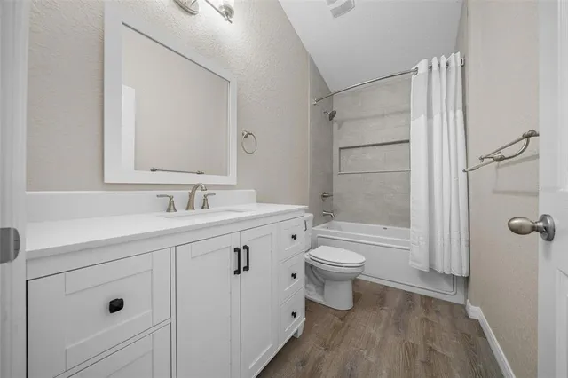 a view of a hallway with mirror