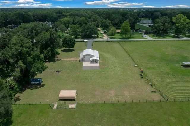 a view of a lake with a yard