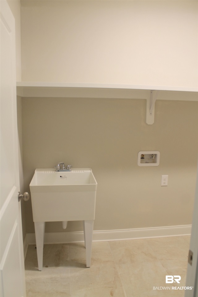 8745 Rosedown Lane Daphne, AL 36526 - Photo 11 of 42 Laundry Room w/sink