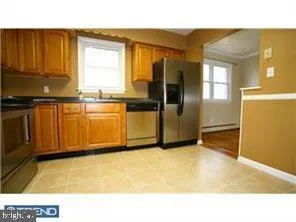 a view of a kitchen with a sink