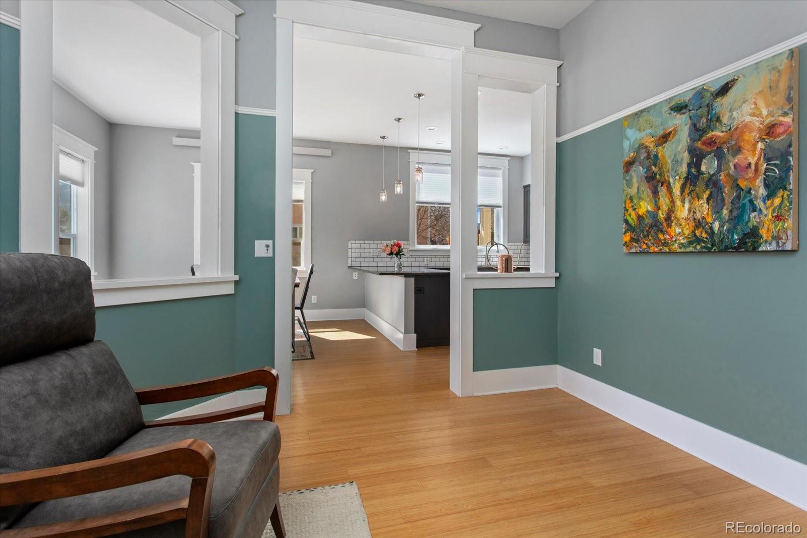 1208 E Street Salida, CO 81201 - Photo 11 of 50 a view of kitchen with furniture and wooden floor