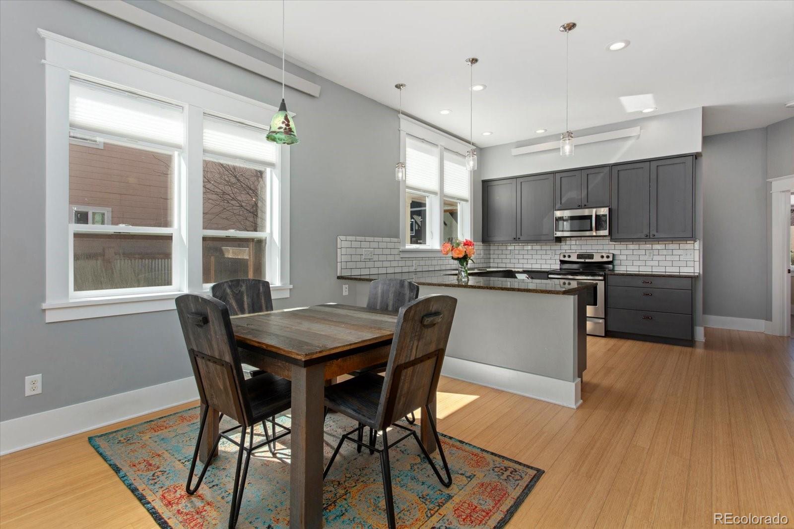 1208 E Street Salida, CO 81201 - Photo 6 of 50 a view of a dining room with furniture and wooden floor