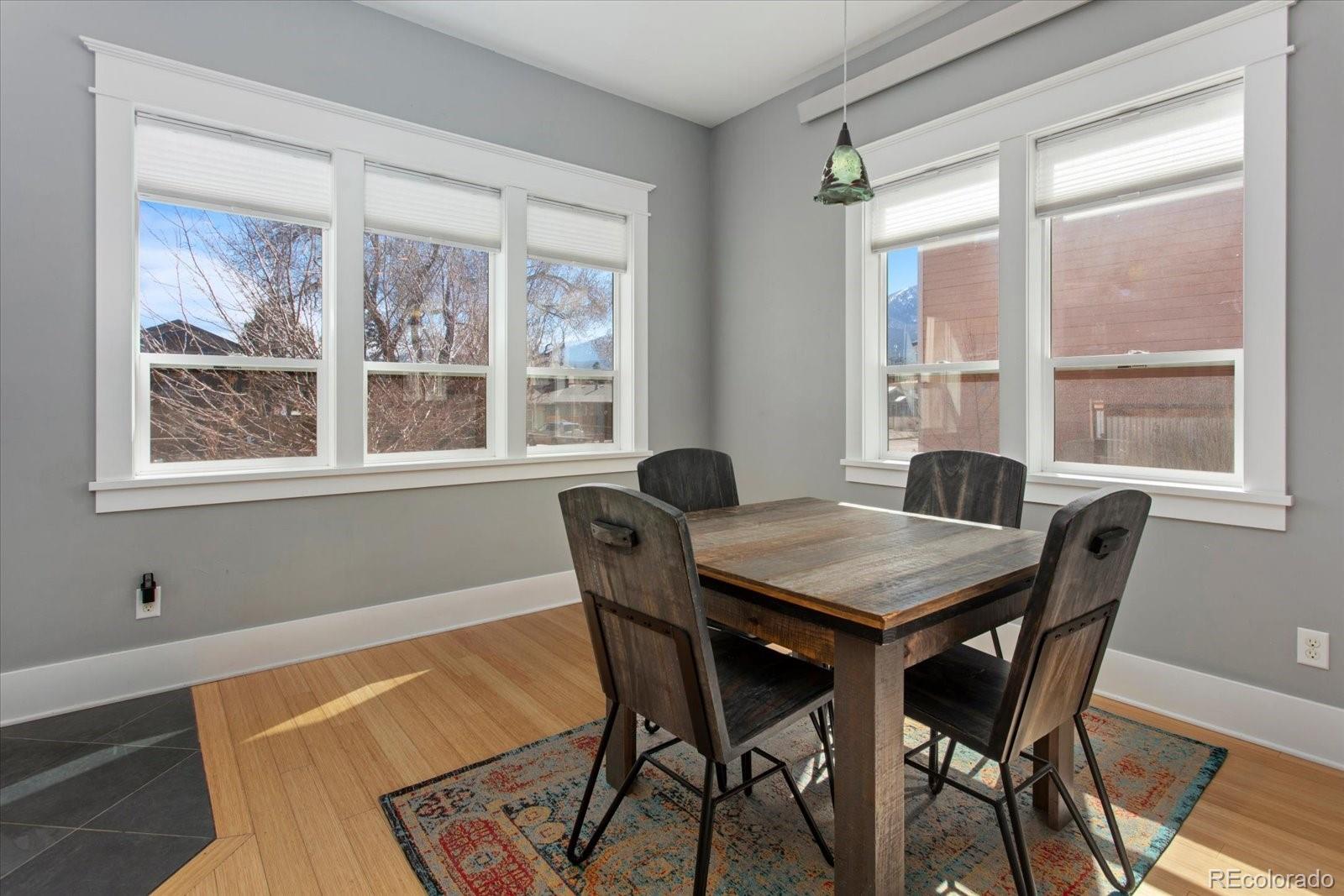 1208 E Street Salida, CO 81201 - Photo 7 of 50 a view of a dining room with furniture and windows