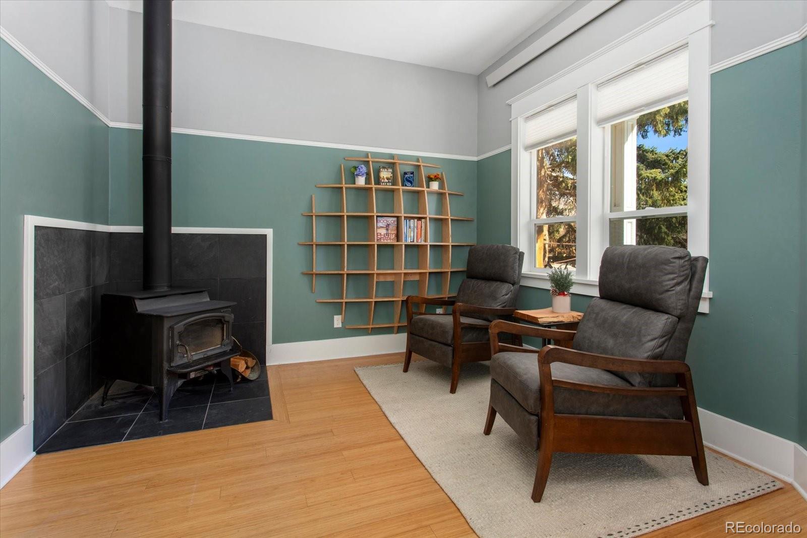 1208 E Street Salida, CO 81201 - Photo 9 of 50 a workspace with furniture and a bookshelf