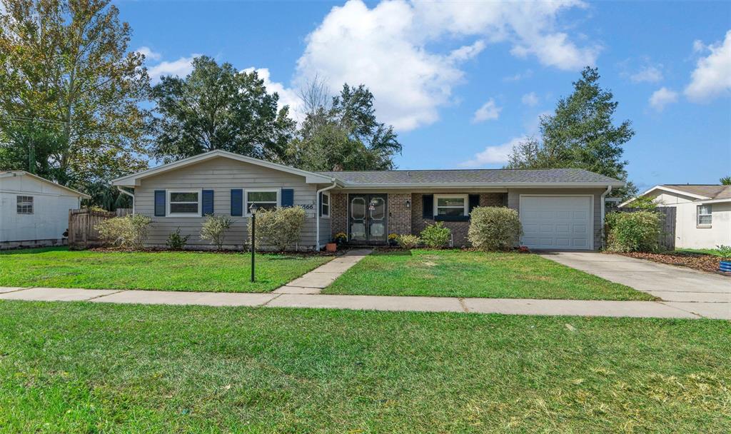 14566 Southwest 34th Terrace Road Ocala, FL 34473 - Photo 1 of 1 a view of outdoor space yard and front view of a house