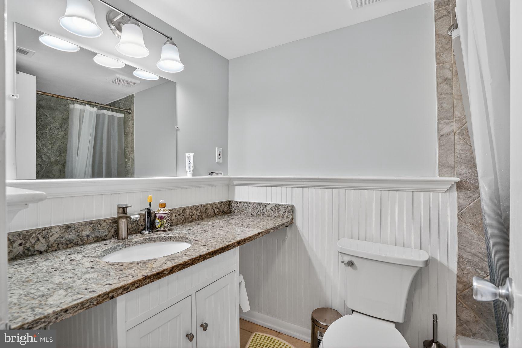 2911 Charing Cross Road, Unit 8 Falls Church, VA 22042 - Photo 11 of 23 Updated bathroom granite vanity Falls Church