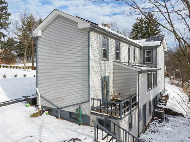 a front view of a house with balcony