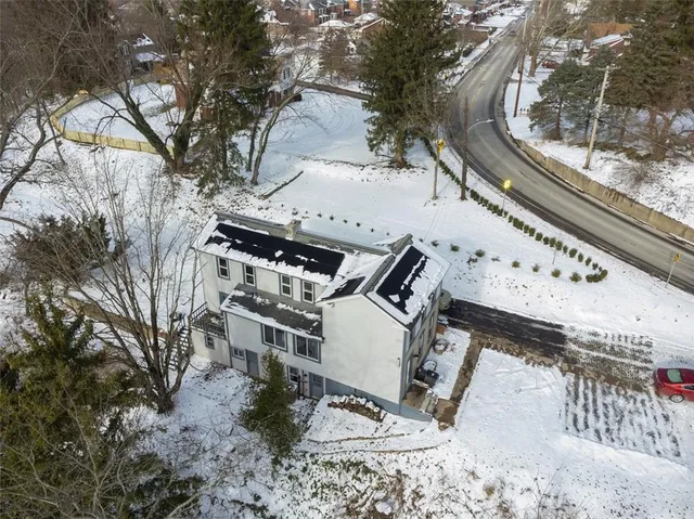 a view of a yard with a patio