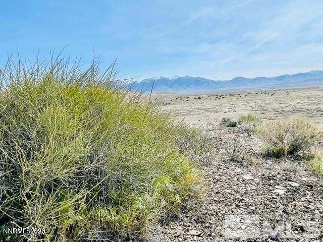 394006 Poker Brown Camp Road Lovelock, NV 89419 - Photo 10 of 11 a view of a large body of water with a building in the background