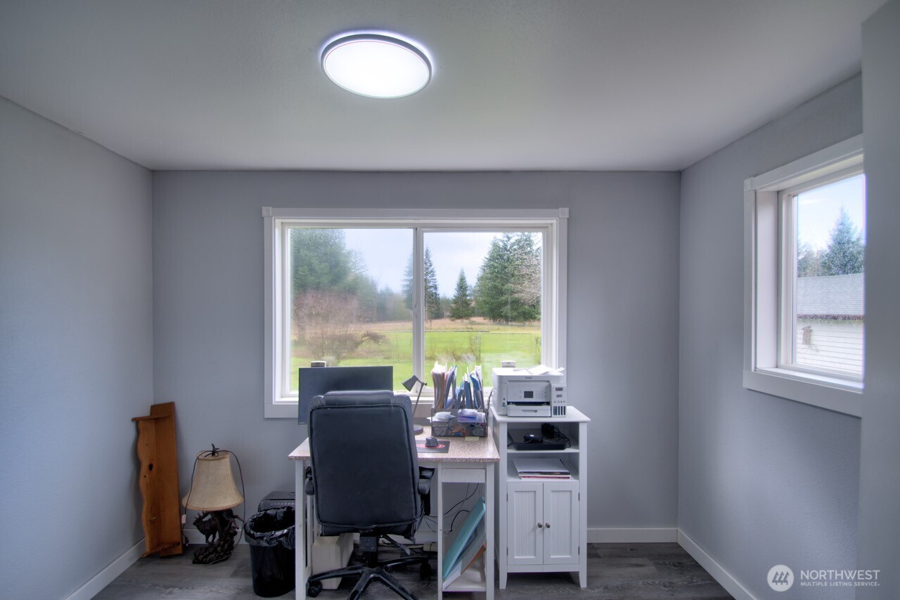 1296 Centralia Alpha Road Chehalis, WA 98532 - Photo 24 of 39 a view of a workspace with furniture and a window