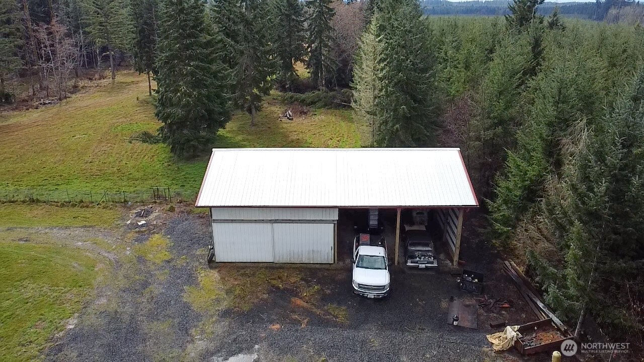 1296 Centralia Alpha Road Chehalis, WA 98532 - Photo 32 of 39 a view of a yard with an outdoor space
