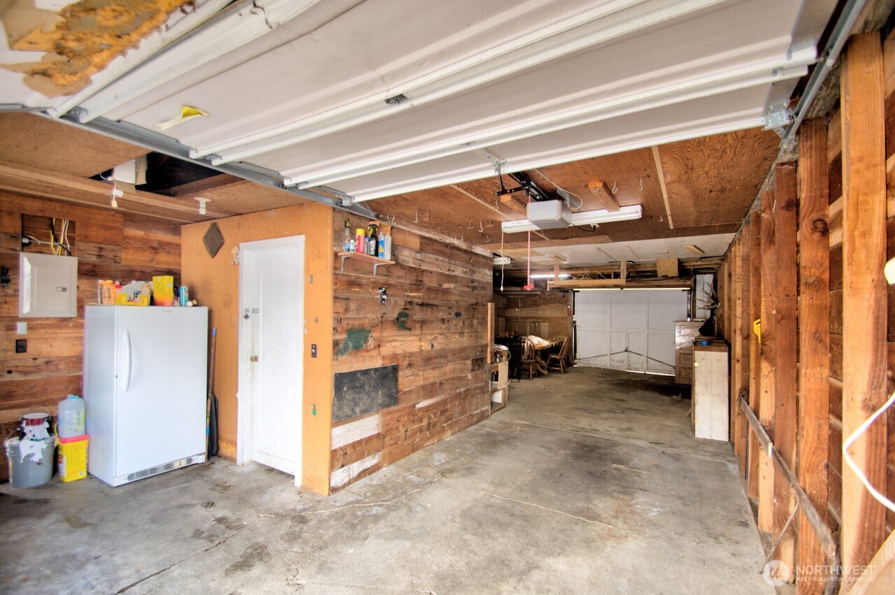 1296 Centralia Alpha Road Chehalis, WA 98532 - Photo 38 of 39 a view of a storage room with a fridge