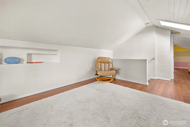 a view of a livingroom with wooden floor