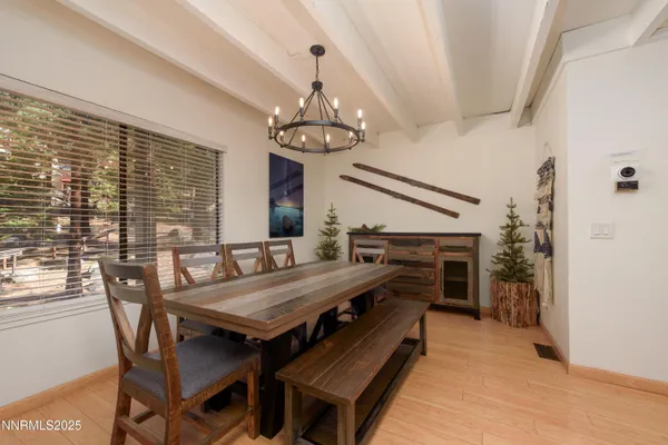 a bedroom with a bed and a table