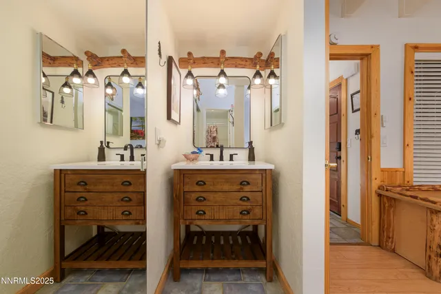 a bedroom with a bed next to a window with the outer view