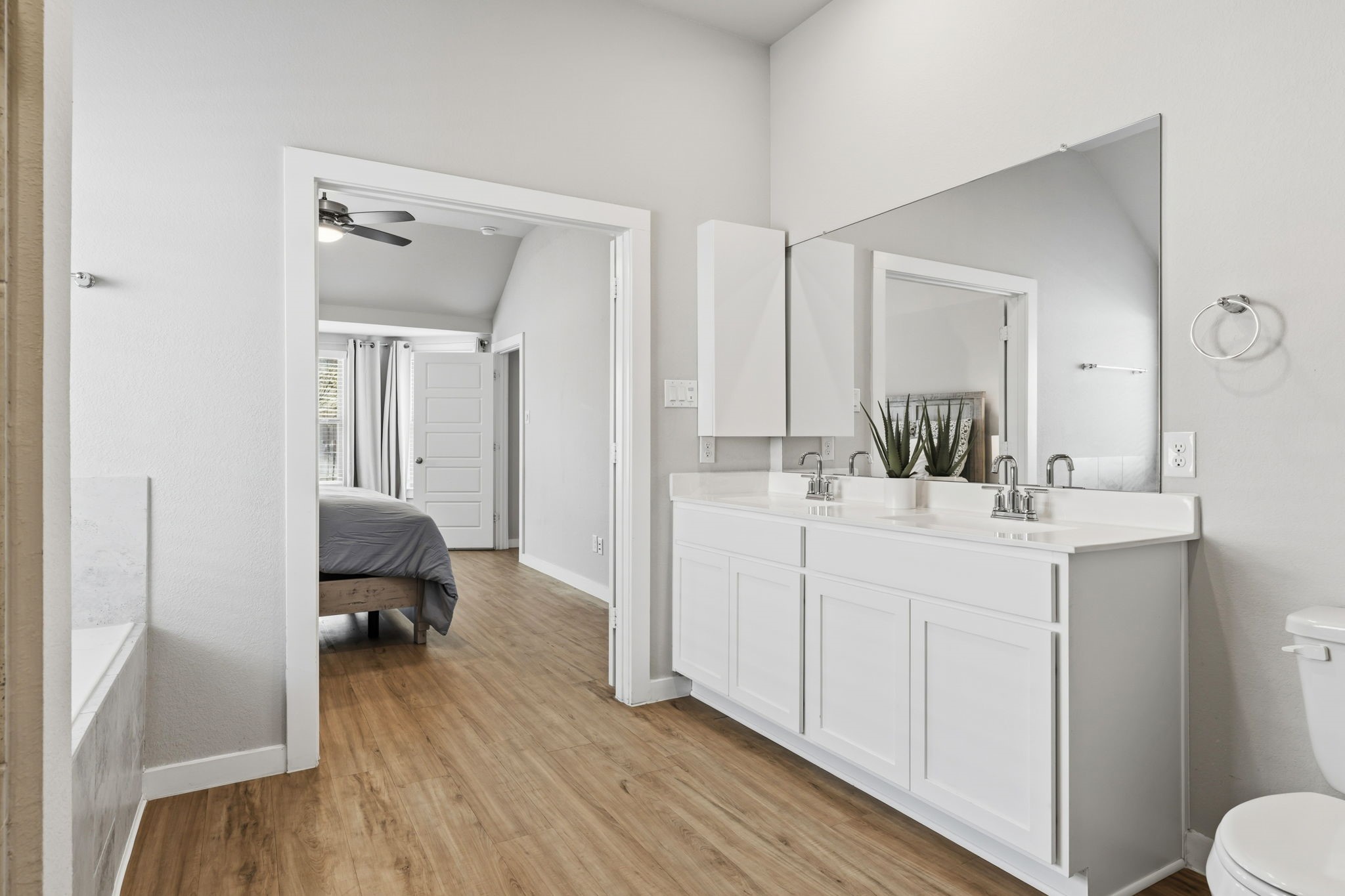 14914 Big Bend Ranch Drive Cypress, TX 77433 - Photo 23 of 49 a bathroom with a sink and a mirror