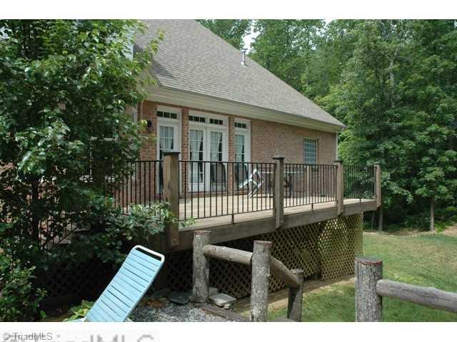 6104 Bar Court Oak Ridge, NC 27310 - Photo 3 of 16 Exterior Back.