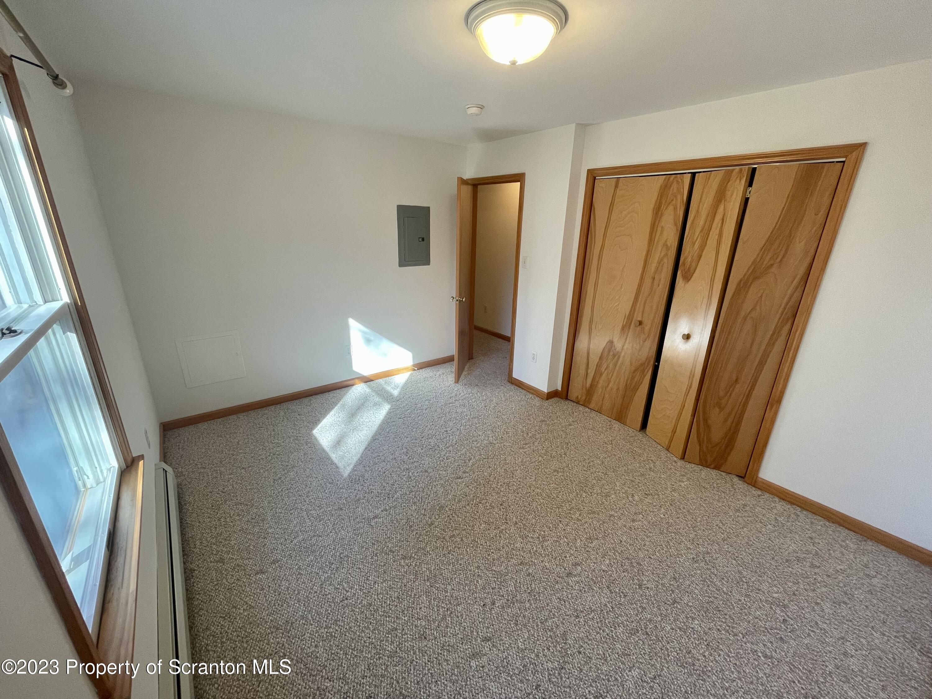 131 Smith Street, Unit A4 Dunmore, PA 18512 - Photo 12 of 12 a view of a room with staircase