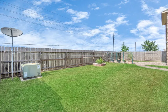 a view of a backyard with a garden