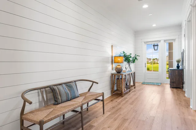 a large kitchen with kitchen island a sink table and chairs