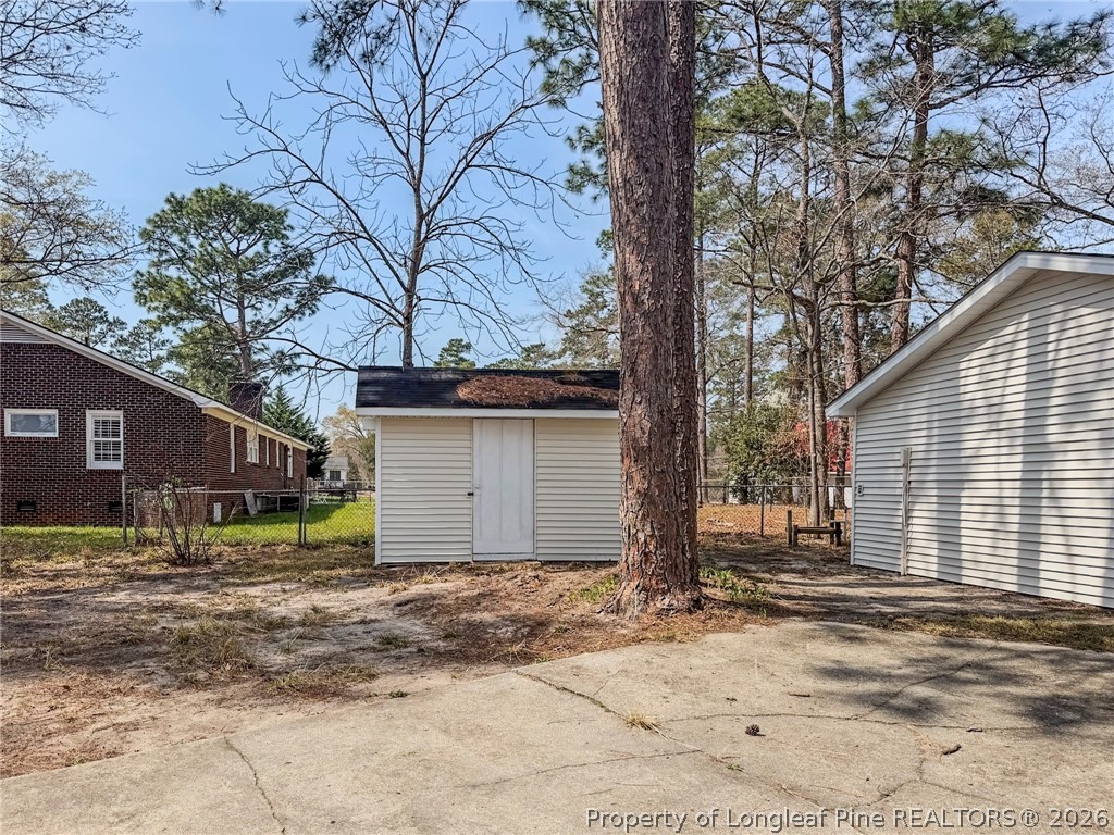 575 Veterans Road St. Pauls, NC 28384 - Photo 27 of 27 a view of a house with a yard