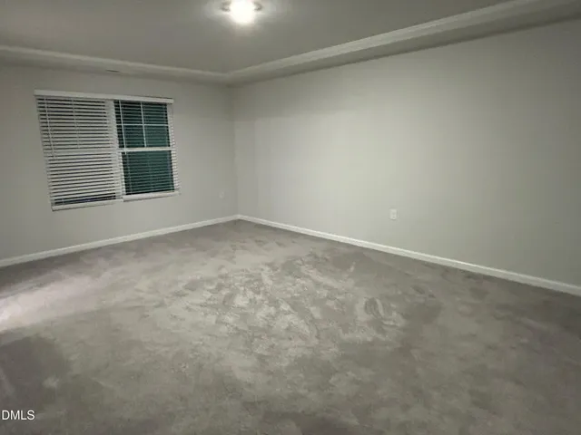 a bathroom with a double vanity sink mirror and shower