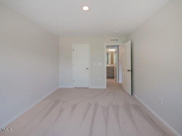 113 Vanilla Orchid Lane Garner, NC 27529 - Photo 5 of 32 a view of an empty room
