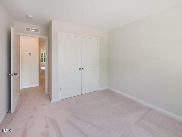 113 Vanilla Orchid Lane Garner, NC 27529 - Photo 6 of 32 a view of an empty room